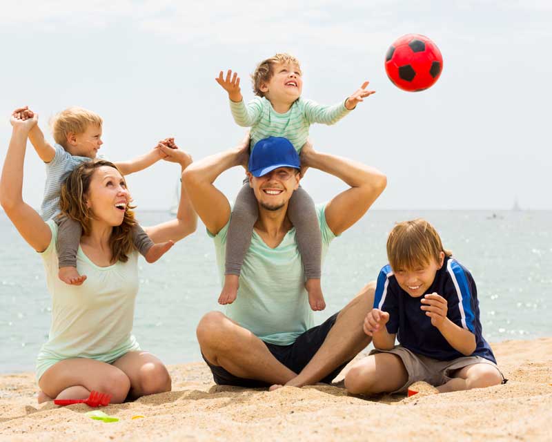 Happy family enjoying summer - Better Health Pharmacy serves families in Fort Worth, TX